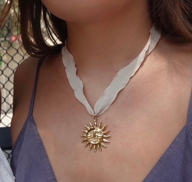 White Ribbon Sun Face Pendant Necklace